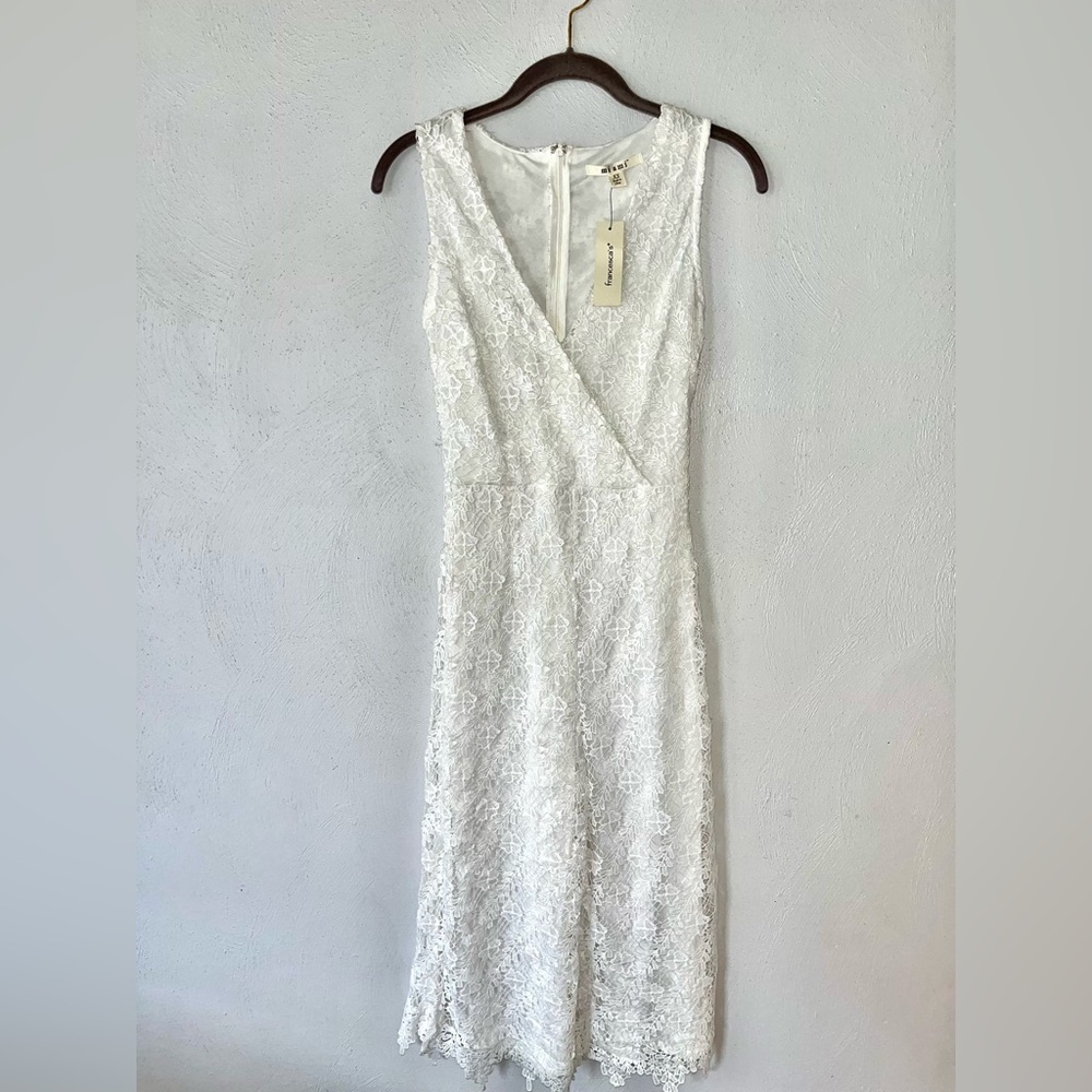 Francesca’s white jump suit